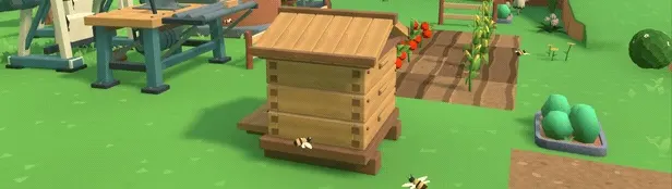 A beehive beside a crop plot.